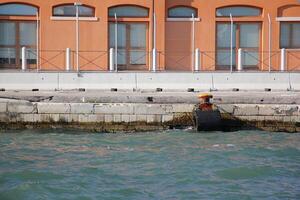 A pier on the shore for mooring boats and yachts. photo