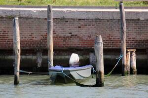 A pier on the shore for mooring boats and yachts. photo