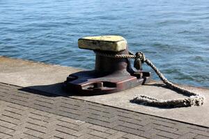 A pier on the shore for mooring boats and yachts. photo