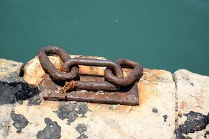 A pier on the shore for mooring boats and yachts. photo