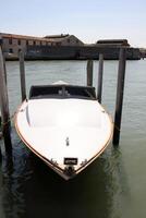 A pier on the shore for mooring boats and yachts. photo