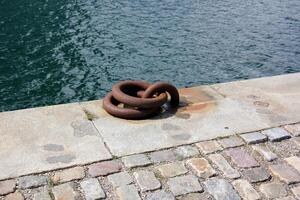 A pier on the shore for mooring boats and yachts. photo