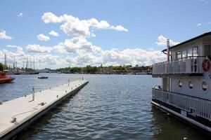 A pier on the shore for mooring boats and yachts. photo