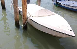 A pier on the shore for mooring boats and yachts. photo