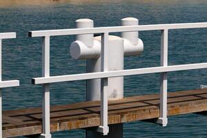 A pier on the shore for mooring boats and yachts. photo