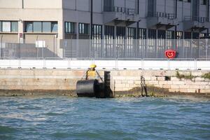 A pier on the shore for mooring boats and yachts. photo