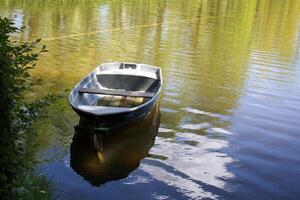 A pier on the shore for mooring boats and yachts. photo