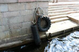 A pier on the shore for mooring boats and yachts. photo