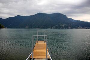 A pier on the shore for mooring boats and yachts. photo