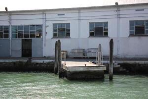 A pier on the shore for mooring boats and yachts. photo