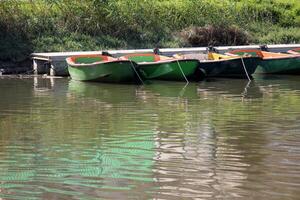 A pier on the shore for mooring boats and yachts. photo