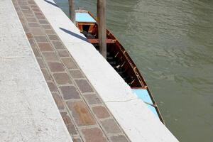 A pier on the shore for mooring boats and yachts. photo