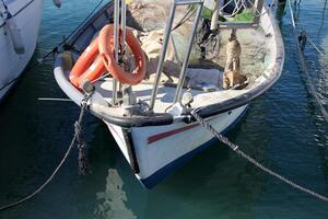 A pier on the shore for mooring boats and yachts. photo