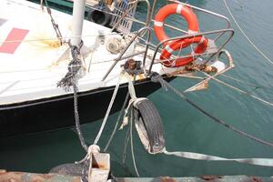 A pier on the shore for mooring boats and yachts. photo