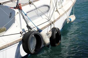 A pier on the shore for mooring boats and yachts. photo