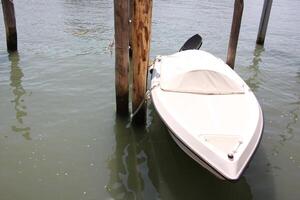 A pier on the shore for mooring boats and yachts. photo