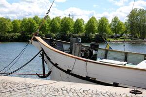 A pier on the shore for mooring boats and yachts. photo