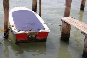 A pier on the shore for mooring boats and yachts. photo