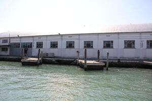 A pier on the shore for mooring boats and yachts. photo