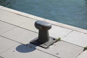 A pier on the shore for mooring boats and yachts. photo