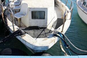 A pier on the shore for mooring boats and yachts. photo