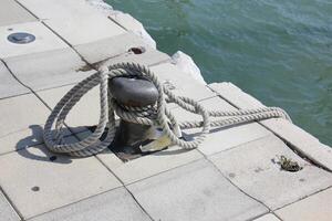 A pier on the shore for mooring boats and yachts. photo