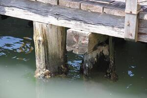 A pier on the shore for mooring boats and yachts. photo