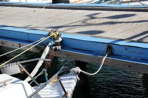 A pier on the shore for mooring boats and yachts. photo