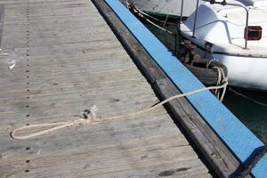 A pier on the shore for mooring boats and yachts. photo