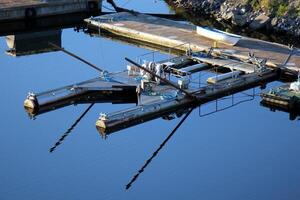 A pier on the shore for mooring boats and yachts. photo