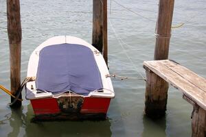 A pier on the shore for mooring boats and yachts. photo