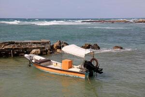 A pier on the shore for mooring boats and yachts. photo