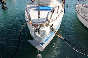 A pier on the shore for mooring boats and yachts. photo