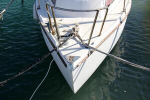 A pier on the shore for mooring boats and yachts. photo