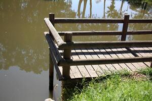 A pier on the shore for mooring boats and yachts. photo