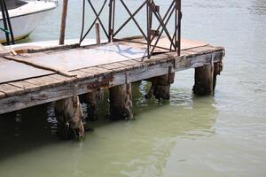 A pier on the shore for mooring boats and yachts. photo