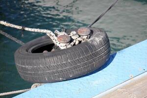 A pier on the shore for mooring boats and yachts. photo