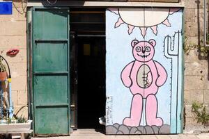 Tel Aviv Israel March 20, 2024. Colorful graffiti on the walls of houses in the city of Tel Aviv. photo