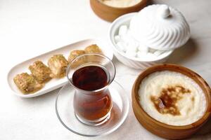 Table With Various Plates of Food and Drinks photo