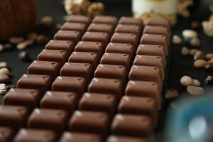 Close Up of a Chocolate Keyboard With Nuts photo