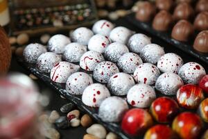 Table Adorned With Trays of Chocolate Covered Apples photo
