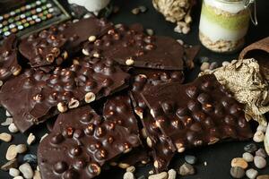 Assorted Chocolate and Nut Pile on Table photo