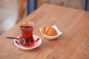 Traditional turkish tea on white table . photo