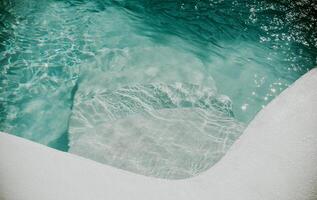 Design and detail of stairs of a home pool. Details of stairs of a home swimming pool photo