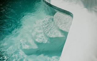 Details of stairs of a home swimming pool. Design and detail of stairs of a home pool photo