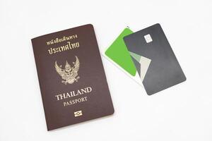 Thai Passport and IC card. vacation, planning budget. travel plan concept. photo