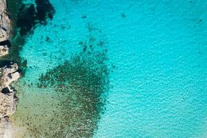 Aerial drone photo - The famous Blue Lagoon in the Mediterranean Sea. Comino Island, Malta.