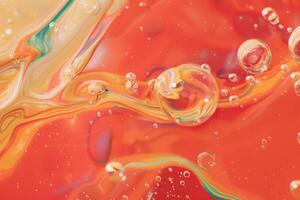 Close Up of Red and Yellow Swirling Liquid photo