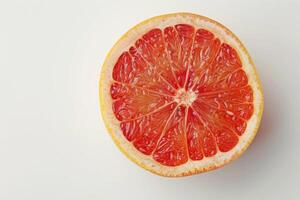 Sliced Grapefruit Segments Isolated on White Background photo