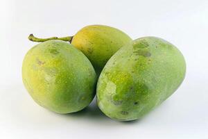 Whole Raw Green Mangoes Isolated on White Background photo